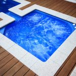 "Apollo" Fiberglass Pool Spa (pictured as backyard pool spa) | Designed and Built By Aqua Technics Pools